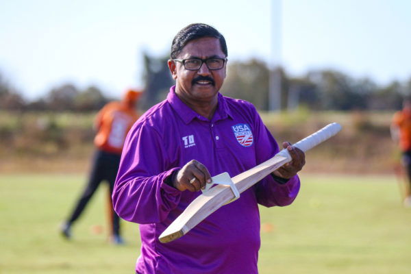 20211115 Umpire Sameer Bandekar measures a bat for legal width